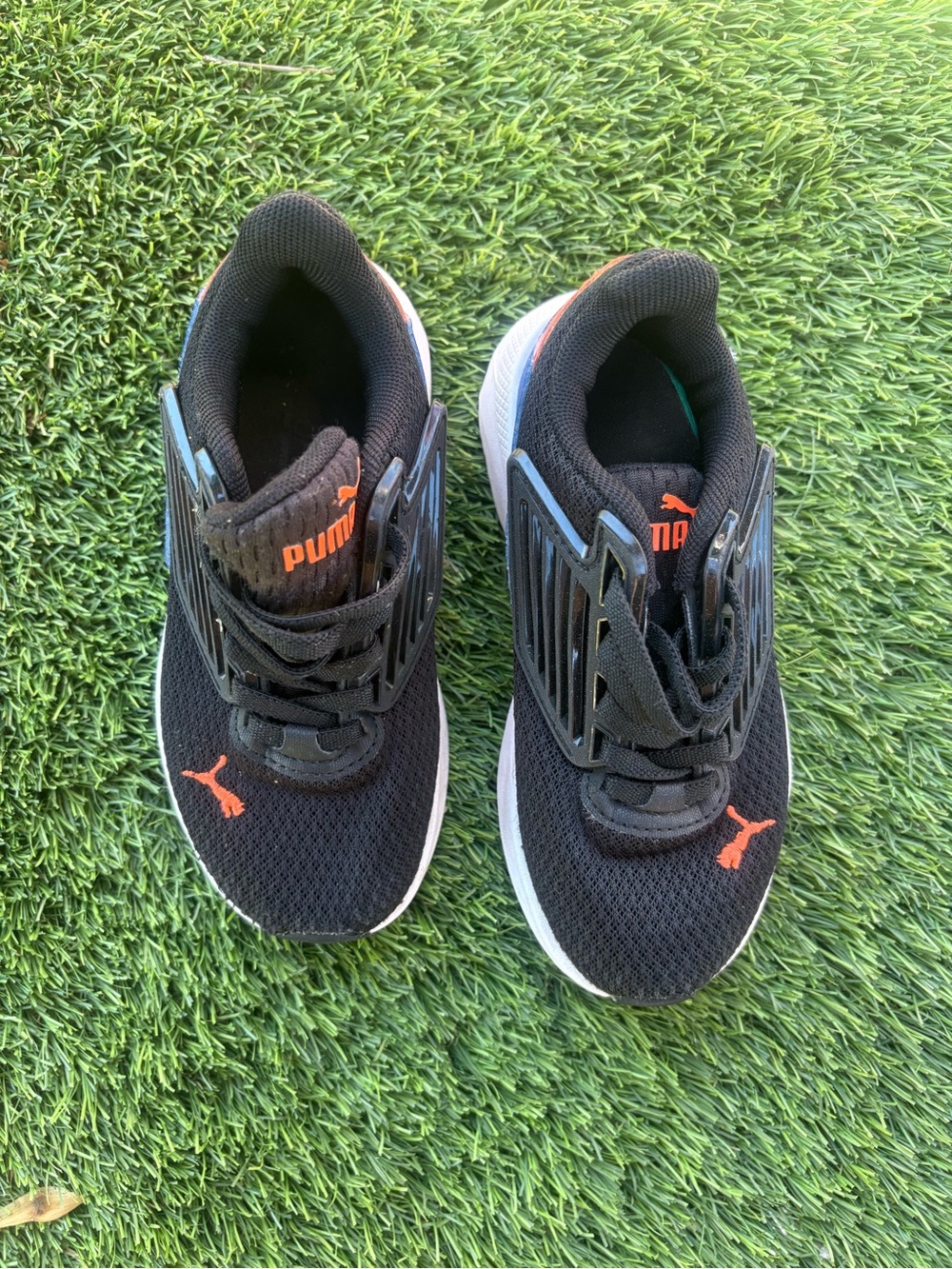 PUMA Black and Orange Kids' Slip-On Athletic Sneakers